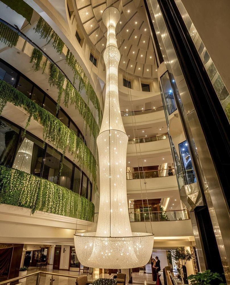 The atrium chandelier through the full section