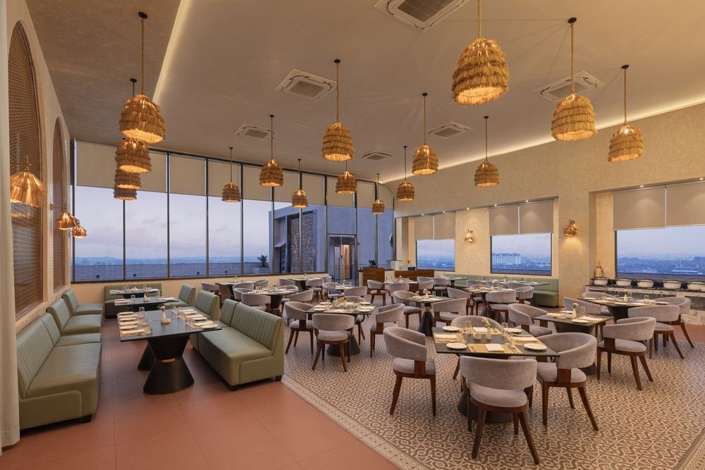 All-day dining under rattan pendants