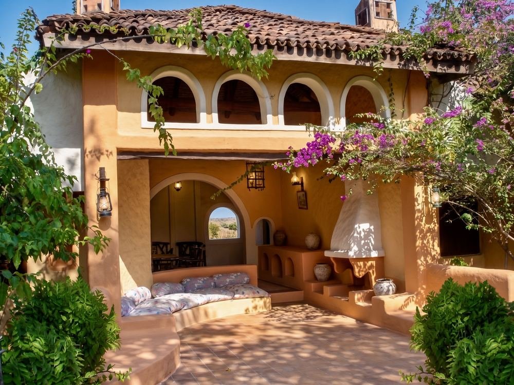 Arched veranda under bougainvillea