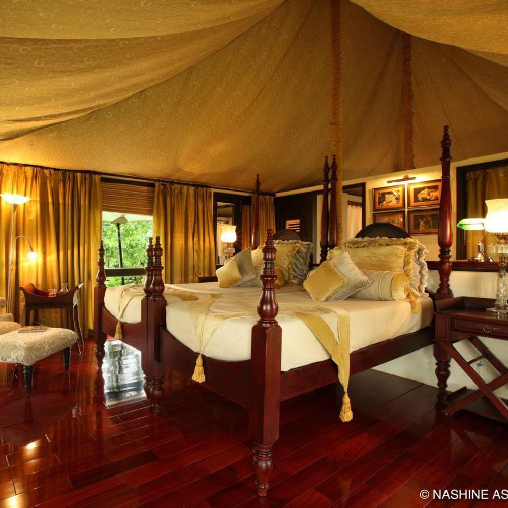 Tent interior with four-poster bed