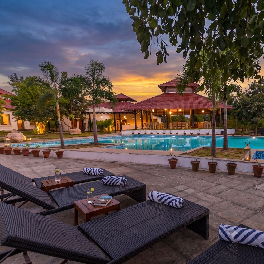 Pool and pavilion at sunset