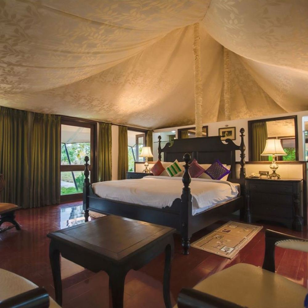 Tent interior with four-poster bed